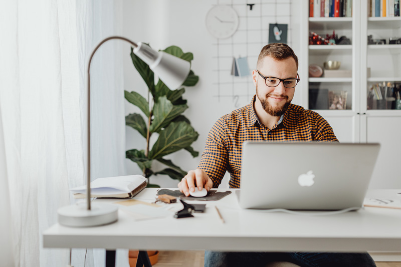 Man using his computer.